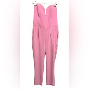 Amanda Uprichard pink strapless jumpsuit.